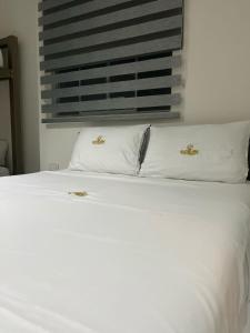 Letto o letti in una camera di Hotel Ocean Fusagasuga