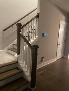 a staircase in a house with a stair case at Entire house 4Bedroom with 4Bath perfect for family in Murfreesboro