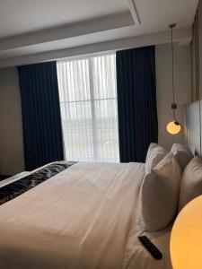 Krevet ili kreveti u jedinici u objektu Grand Miami Hotel