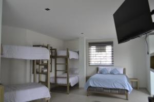 Letto o letti in una camera di Hotel Ocean Fusagasuga