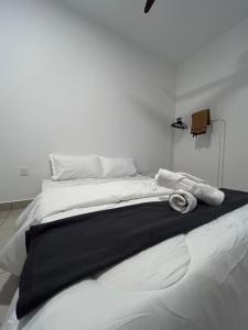 Кровать или кровати в номере House of thinkers @Putrajaya