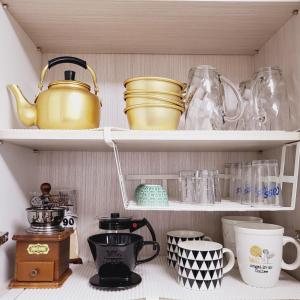 a cupboard filled with lots of pots and pans at 1978 stay in Seoul