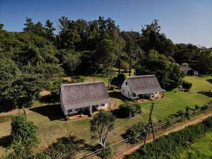 an aerial view of a house with two roofs at Mabuda Guest Farm in Stegi