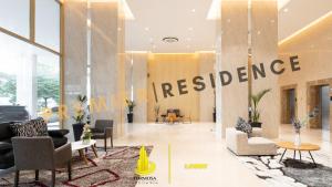 an office lobby with a reference sign on the wall at PREMIER RESIDENCES @Formosa Residence Nagoya in Nagoya
