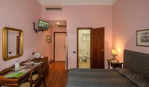 TV a/nebo společenská místnost v ubytování Hotel Rex