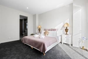 Woodforde 3BR house with an amazing view客房内的一张或多张床位