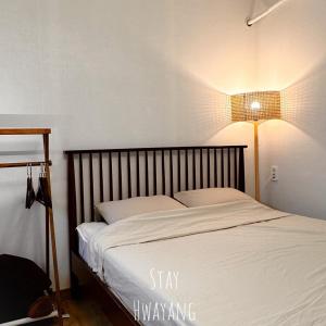 Postel nebo postele na pokoji v ubytování Damyang Hwayang
