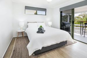 High On Jeffery in the Heart of Agnes Water客房内的一张或多张床位