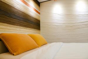 Letto o letti in una camera di Byeoldeul-ui Gichim Pension