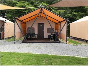 a large tent with a table and chairs in it at Damyang Raon Glamping in Damyang +8 photos