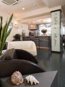 Kuchyň nebo kuchyňský kout v ubytování Hotel Alba