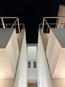 a view of a building with white architecture at MYROVOLOS APARTMENTS in Chios