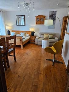 a living room with a couch and a table at Zajazd Karczma Zagłoba in Świdnica