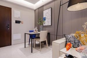 Area soggiorno di Excellence International Apartment - Convention & Exhibition Center