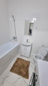 Ett badrum på Tole Bi 46, Nova City на Туране, 1 подъезд
