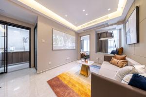 Area soggiorno di Excellence International Apartment - Convention & Exhibition Center