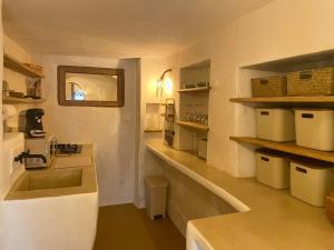 a kitchen with a sink and a counter top at Felicità : appartement atypique centre Bastia in Bastia +15 photos