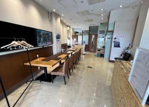 TV a/nebo společenská místnost v ubytování Izu-no-umi Hotel