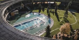 The swimming pool at or close to OLM Nature Escape - Eco Aparthotel