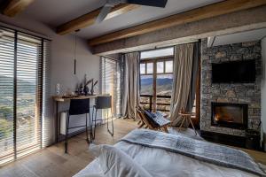 A bed or beds in a room at Chalet Azanias Kalavryta