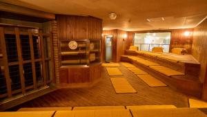 a room with a sauna with wooden walls at Miyazaki Daiichi Hotel in Miyazaki +86 photos