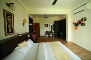Giường trong phòng chung tại Paddyfield Inn
