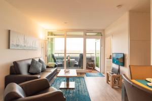 Posezení v ubytování Ferienwohnung Achterdeck