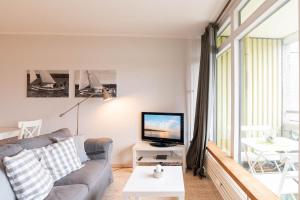 TV a/nebo společenská místnost v ubytování Ferienwohnung Alkoven