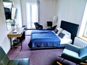 Katil atau katil-katil dalam bilik di Family hotel Maxim
