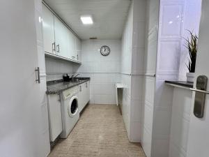 A kitchen or kitchenette at Las Palomas Beach
