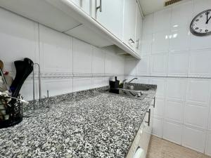 A kitchen or kitchenette at Las Palomas Beach