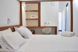 Voodi või voodid majutusasutuse JIRAJIRA HOTEL toas