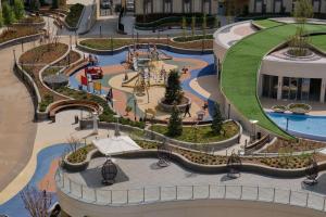 an aerial view of a playground at a shopping mall at STYLO Residences & Suites in Tashkent