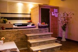 Kuchyň nebo kuchyňský kout v ubytování Hotel Paradiso
