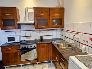 Dapur atau dapur kecil di Family hotel Maxim