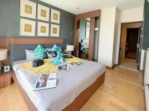 מיטה או מיטות בחדר ב-The Astra Condo Changkhlan in Chiang Mai