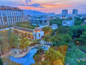 an aerial view of a resort with a pool at The Astra Condo Changkhlan in Chiang Mai in Chiang Mai