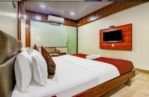 Ліжко або ліжка в номері Hotel Shree Daan