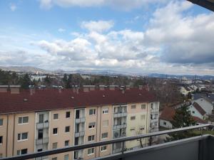 a view from the balcony of a building at Reindeer - Wohnen über den Dächern von Traun in Linz