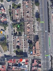 a map of a street with a green traffic light at Apartamento acogedor. in Gelves