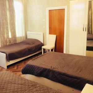Postel nebo postele na pokoji v ubytování Family House Shorety