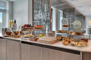 a buffet line with many different types of food at GRANO HOTEL Solmarina in Wiślinka