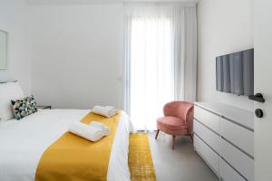 Posteľ alebo postele v izbe v ubytovaní Villa Bonita