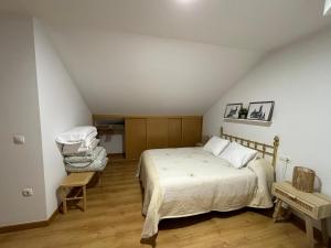 Кровать или кровати в номере O Pequeno Rincón