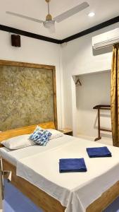 Letto o letti in una camera di Coco Cottage Local Style