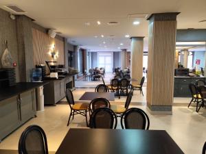 Kuchyň nebo kuchyňský kout v ubytování Hotel Hidalgo