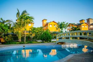 La alberca dentro o cerca de Golden Duranta Villas