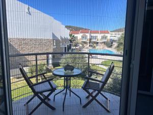 Balkón nebo terasa v ubytování Grapevines Villas Makrygialos