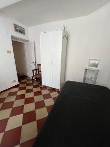 A bed or beds in a room at In piazzetta a Nervi
