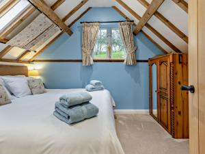 Ένα ή περισσότερα κρεβάτια σε δωμάτιο στο 3 Bed in Bridgnorth 94532